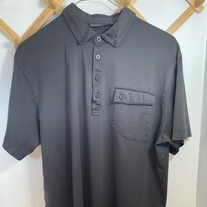 Size large black Devereux golf polo with chest pocket.